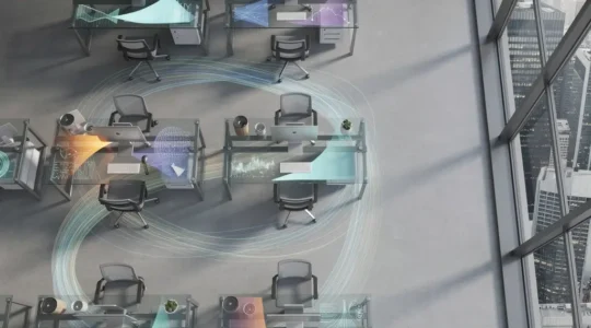 Vue panoramique d'un espace de travail moderne avec tableaux de bord analytiques et graphiques de progression client